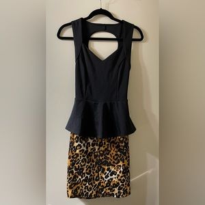 Black and cheetah print fitted dress with peplum ruffle